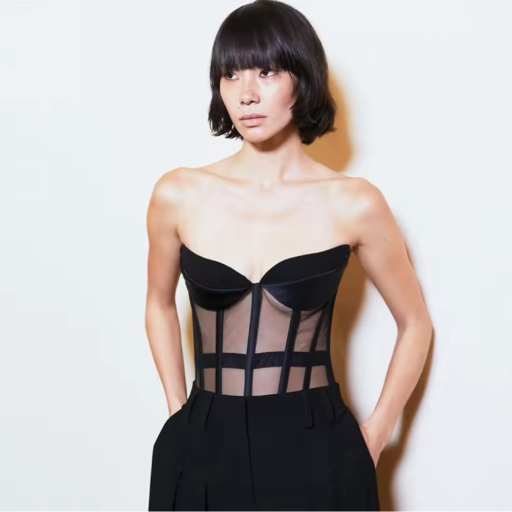 Meshed bustier corset with boning.